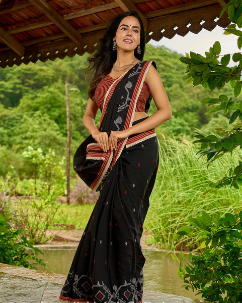 Black cotton saree blending Jamdani-inspired weaves with Ajrakh elegance