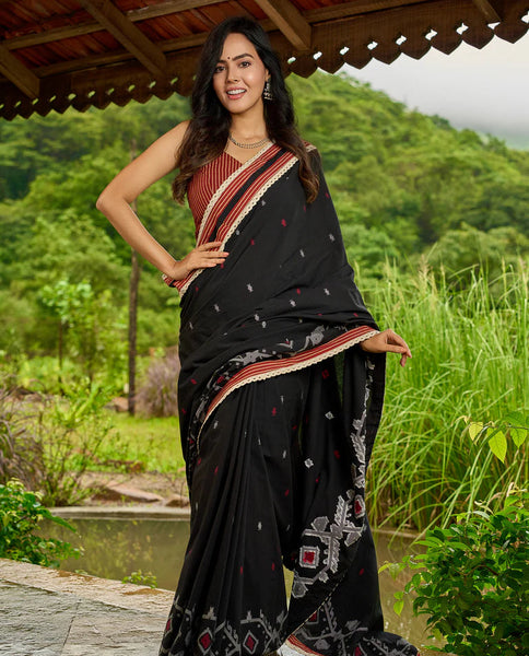 Black cotton saree blending Jamdani-inspired weaves with Ajrakh elegance