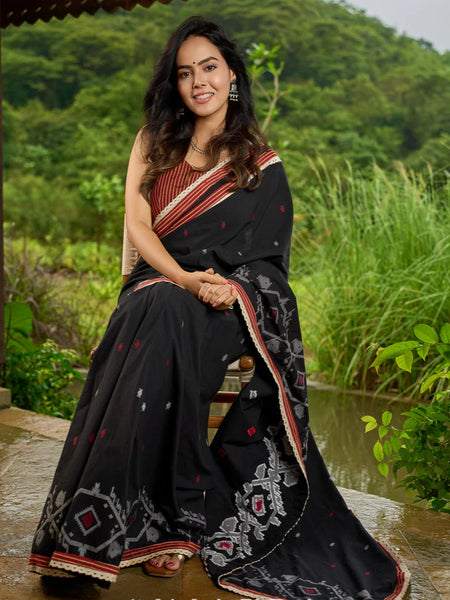 Black cotton saree blending Jamdani-inspired weaves with Ajrakh elegance