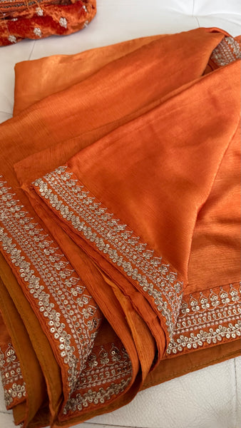 Orange Crepe Silk Saree with Zardosi Border