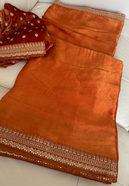 Orange Crepe Silk Saree with Zardosi Border