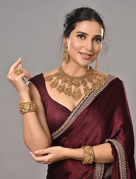 Magenta Wine Crepe Silk Sarees with Sabyasachi Border with Velvet Blouse