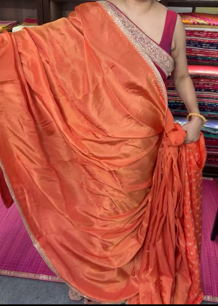 Orange Crepe Silk Saree with Zardosi Border