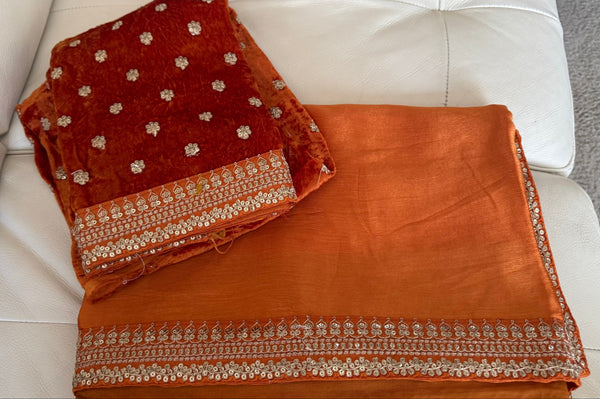 Orange Crepe Silk Saree with Zardosi Border