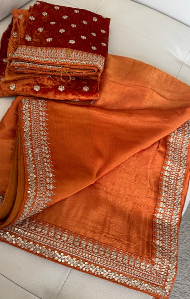 Orange Crepe Silk Saree with Zardosi Border