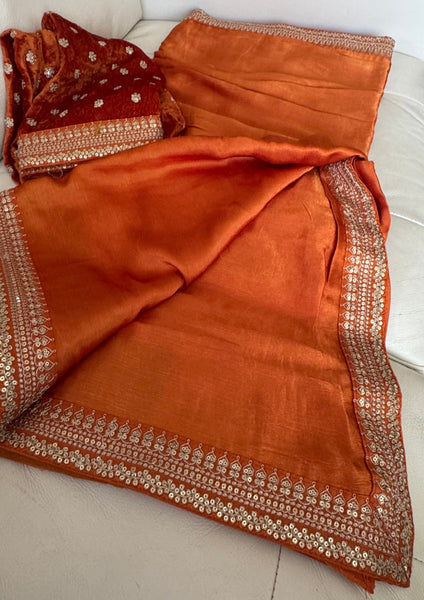 Orange Crepe Silk Saree with Zardosi Border