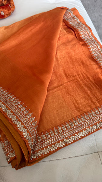 Orange Crepe Silk Saree with Zardosi Border