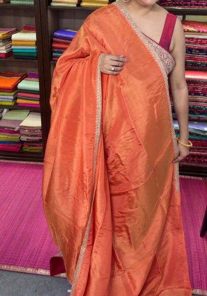 Orange Crepe Silk Saree with Zardosi Border