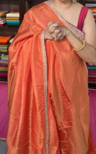 Orange Crepe Silk Saree with Zardosi Border