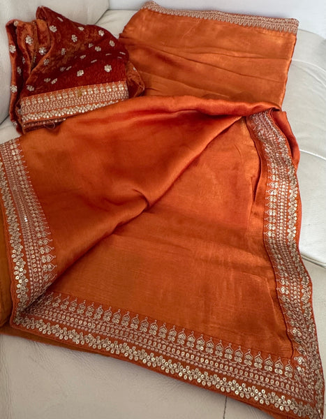 Orange Crepe Silk Saree with Zardosi Border