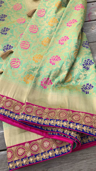 Pastel Green Pure Banarasi Brocade Silk Saree with Readymade Stitched Blouse.