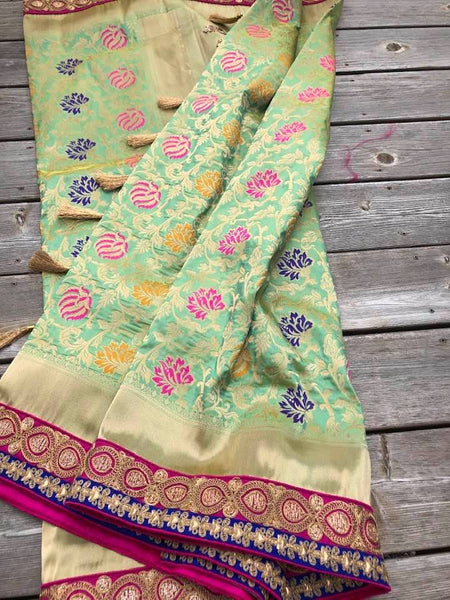 Pastel Green Pure Banarasi Brocade Silk Saree with Readymade Stitched Blouse.