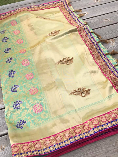 Pastel Green Pure Banarasi Brocade Silk Saree with Readymade Stitched Blouse.