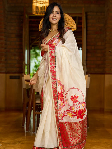 White Chanderi saree with Benarasi border featuring artisanal hand-painted floral motifs