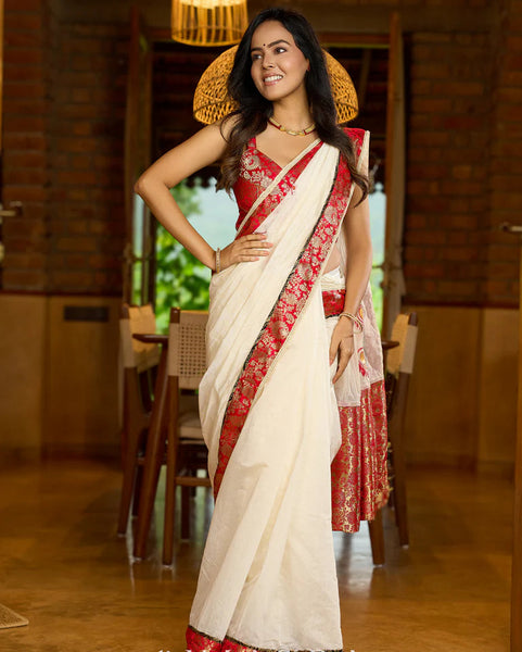 White Chanderi saree with Benarasi border featuring artisanal hand-painted floral motifs