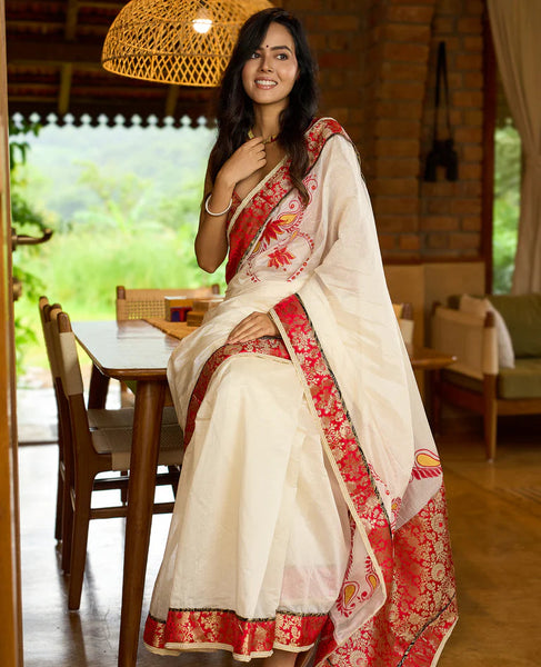 White Chanderi saree with Benarasi border featuring artisanal hand-painted floral motifs