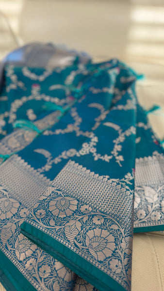 PEACOCK BLUE FLORAL SILK SAREE with SILVER ZARI BORDER