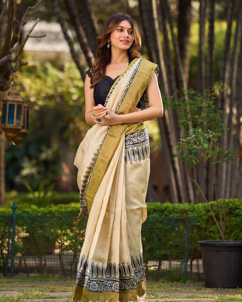 Off-White Handwoven Pure Tussar Silk Block Printed Saree with Traditional Green and Gold Zari Detailing