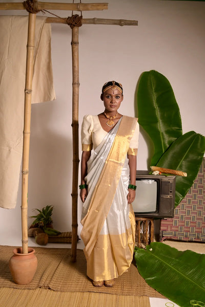 Off white mul cotton handwoven saree with golden border