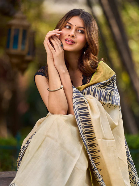 Off-White Handwoven Pure Tussar Silk Block Printed Saree with Traditional Green and Gold Zari Detailing