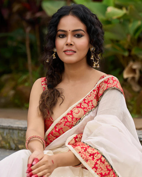 Ivory elegance with royal Red Banarasi border