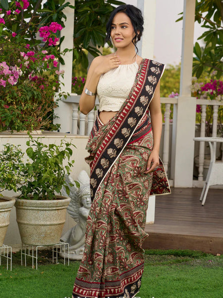 Green paisley cotton saree with contrast black pallu and border