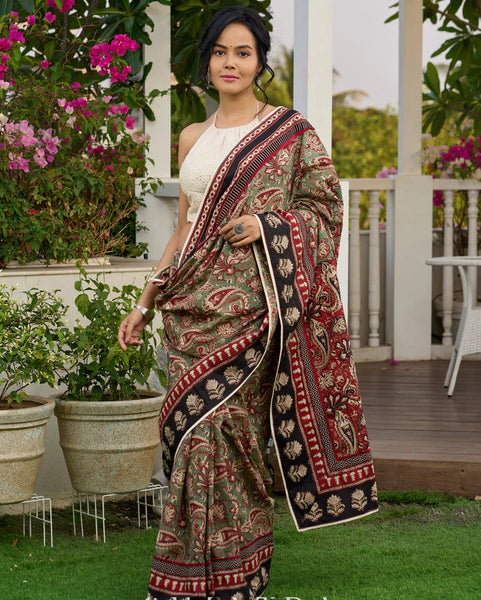 Green paisley cotton saree with contrast black pallu and border