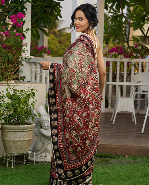 Green paisley cotton saree with contrast black pallu and border