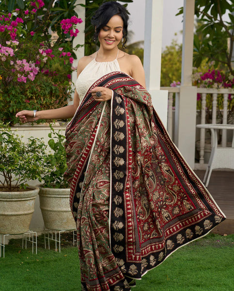 Green paisley cotton saree with contrast black pallu and border