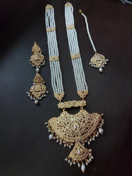 5 Lada rani haar with earrings n tikka/hydrabadi Jadau pearls n gold set with tikka