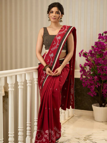 Jamdani saree in regal red with intricate motifs and lace borders