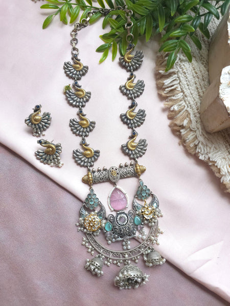 Silveralike Dualtone Brass Kundan Pink and Blue Necklace and Earring Set