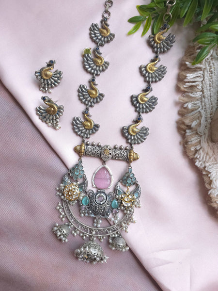 Silveralike Dualtone Brass Kundan Pink and Blue Necklace and Earring Set