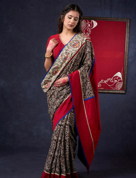 Cotton Ajrakh saree with Hand painted Madhubani Border