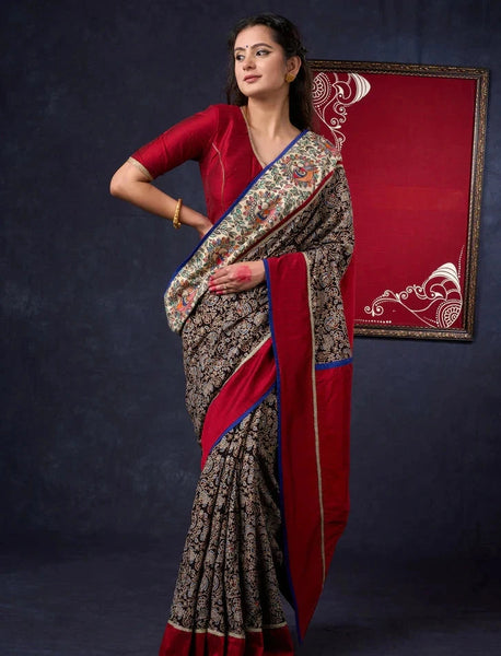 Cotton Ajrakh saree with Hand painted Madhubani Border