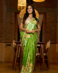 pure silk beauty in green with vibrant hand batik floral motif