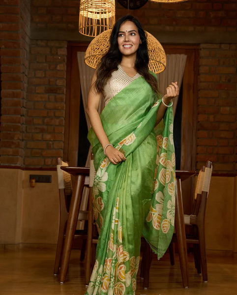 pure silk beauty in green with vibrant hand batik floral motif