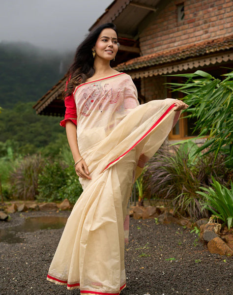 Cream Chanderi saree with subtle red border, featuring hand-painted Durga art