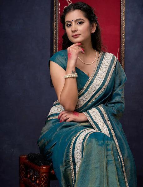 Iridescent Blue Tissue saree Highlighted with Lace Detailing