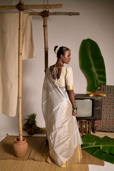 Off white mul cotton handwoven saree with golden border