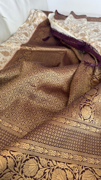 Off White Banarasi Crepe Silk Saree with Deep Purple Border