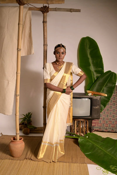 Off white mul cotton handwoven saree with golden border