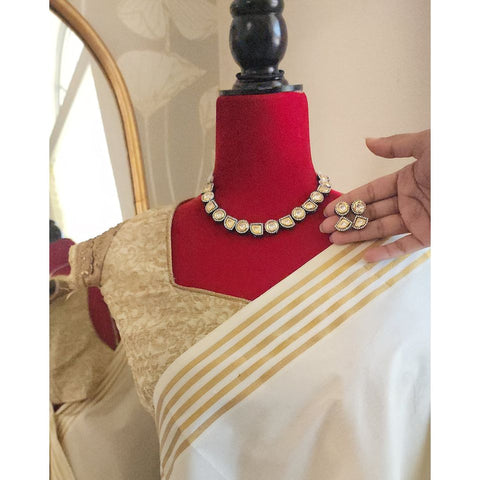 Rodium and goldplated dualtone kundan statement necklace set