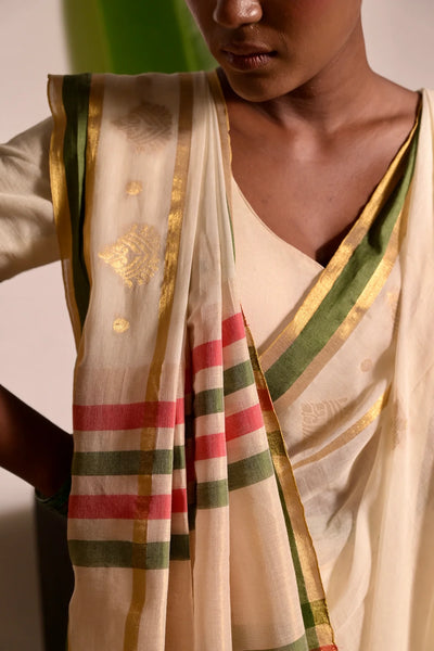 Off white handwoven mul cotton saree with green and zari border
