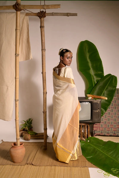 Off white mul cotton handwoven saree with golden border