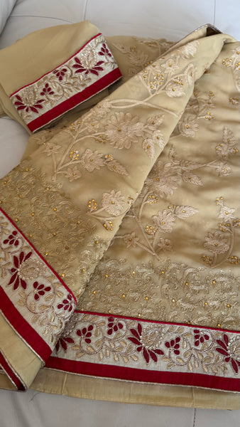 Sandy Off White Georgette Silk Saree with Red Border