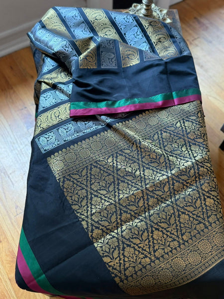 Black and Tricolor soft silk saree with contrast piping and a grand brocade blouse!