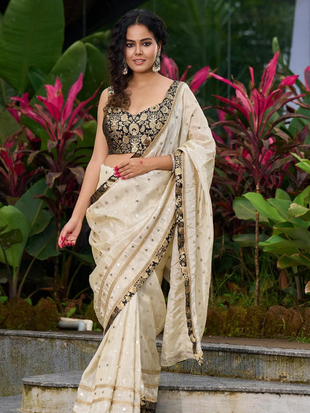 Ivory tissue saree featuring zari embroidery and Banarasi accents