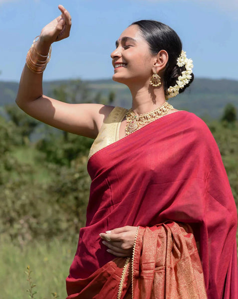 Maroon and gold half-and-half saree with Gota patti and Samosa lace