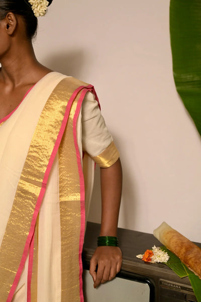 Off white mul cotton handwoven saree with golden and pink border